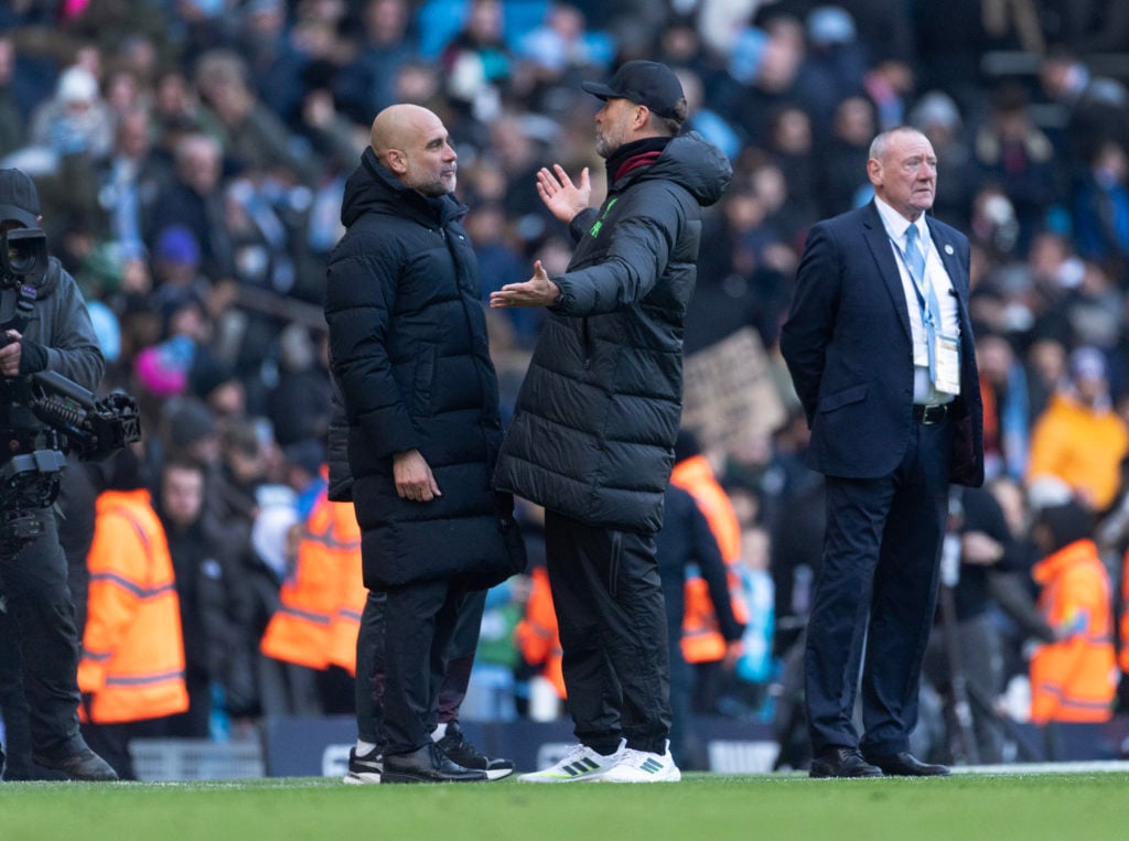Manchester City manager Pep Guardiola and Liverpool manager Jurgen Klopp exchange words after the Premier League match between Manchester City and ...