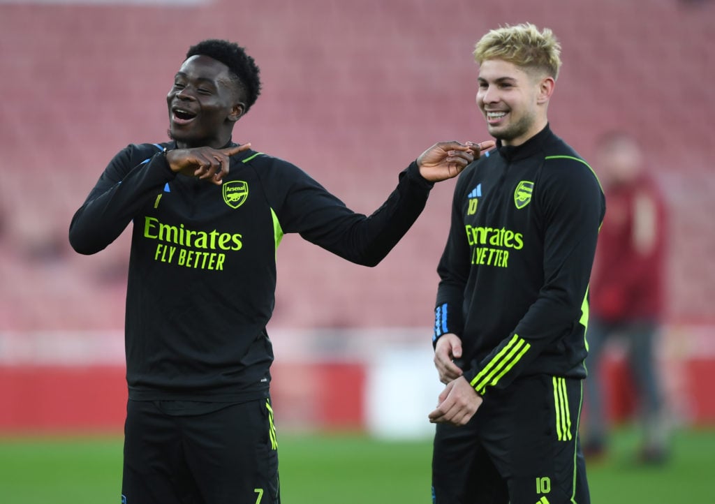 (L-R) Bukayo Saka and Emile Smith Rowe of Arsenal during a training session at Emirates Stadium on January 26, 2024 in London, England.