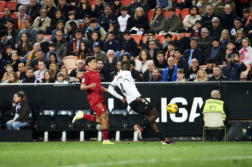 Mouctar Diakhaby of Valencia CF and Alejo Veliz of Sevilla