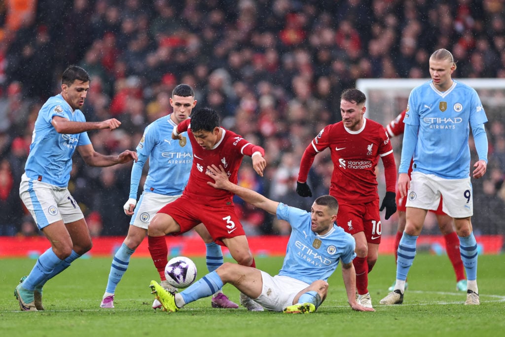 Wataru Endo of Liverpool during the Premier League match between Liverpool FC and Manchester City at Anfield on March 10, 2024 in Liverpool, England.