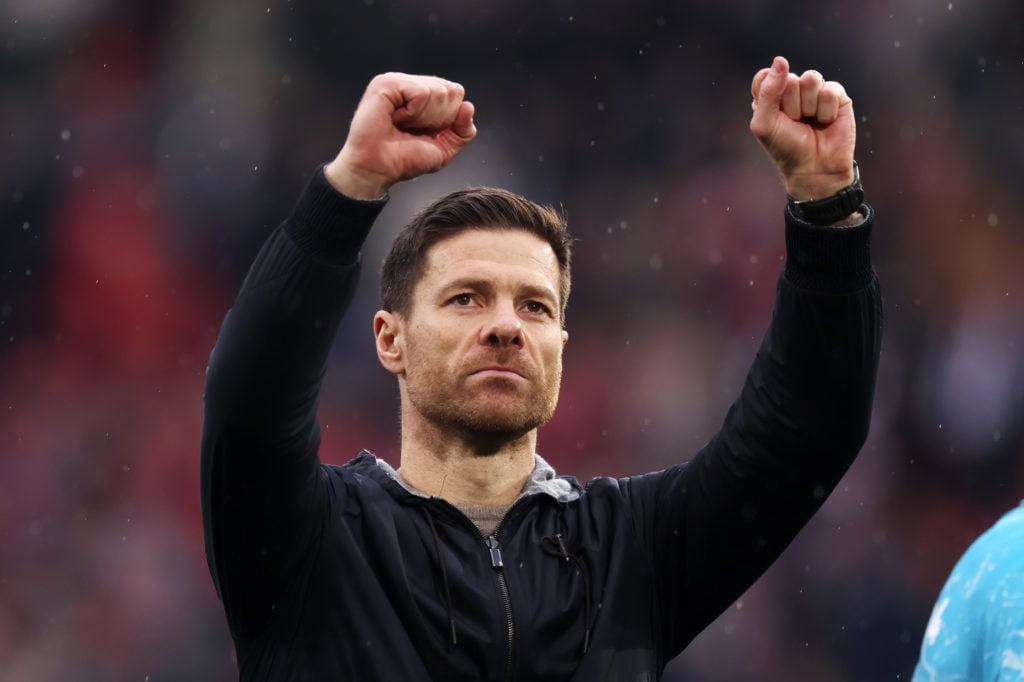 Xabi Alonso, Head Coach of Bayer Leverkusen, celebrates following the team's victory in the Bundesliga match between Sport-Club Freiburg and Bayer ...