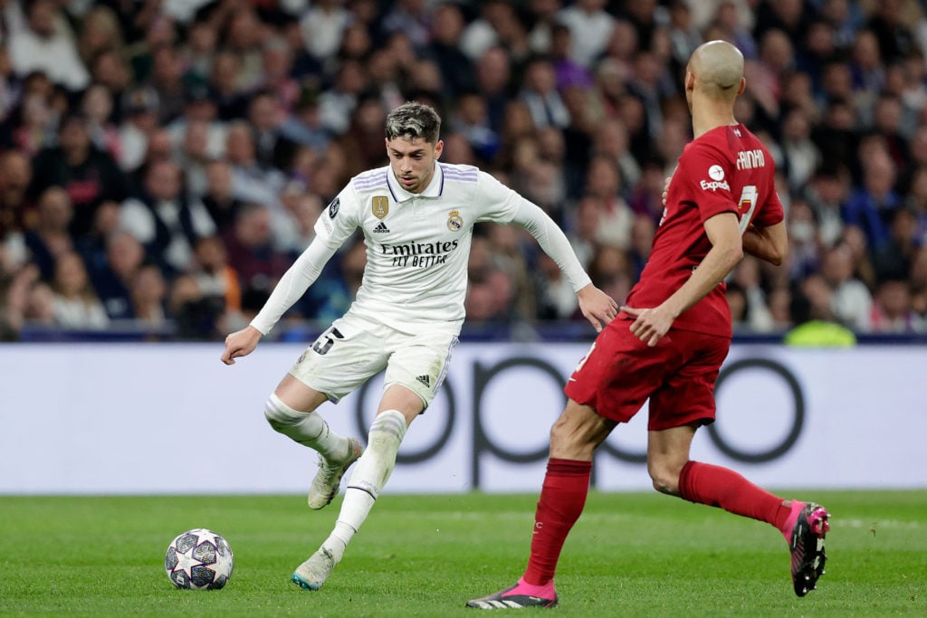 (L-R) Fede Valverde of Real Madrid, Fabinho of Liverpool FC  during the UEFA Champions League  match between Real Madrid v Liverpool at the Estadio...