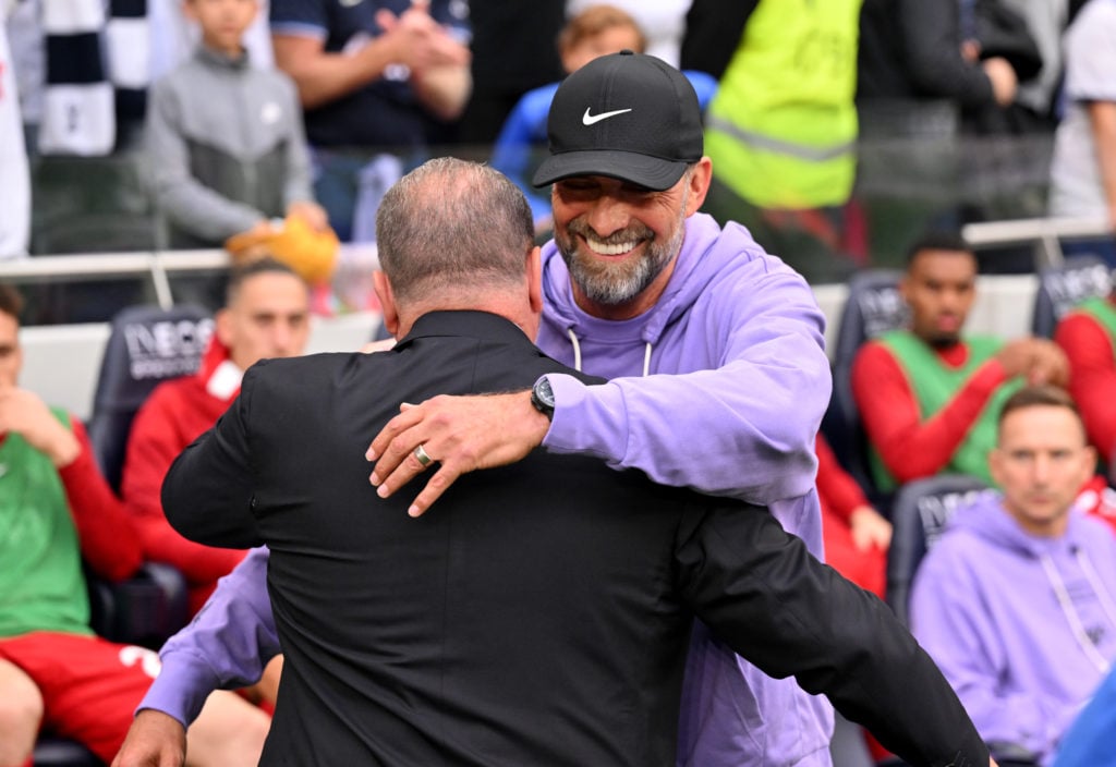 (THE SUN OUT, THE SUN ON SUNDAY OUT) Jurgen Klopp manager of Liverpool embracing Ange Postecoglou manager of Tottenham Hotspur before the Premier L...