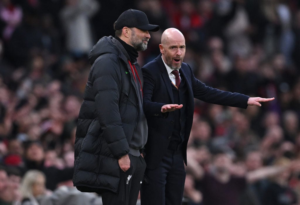 Jurgen Klopp, Manager of Liverpool and Erik ten Hag, Manager of Manchester United chat during the Emirates FA Cup Quarter Final between Manchester ...