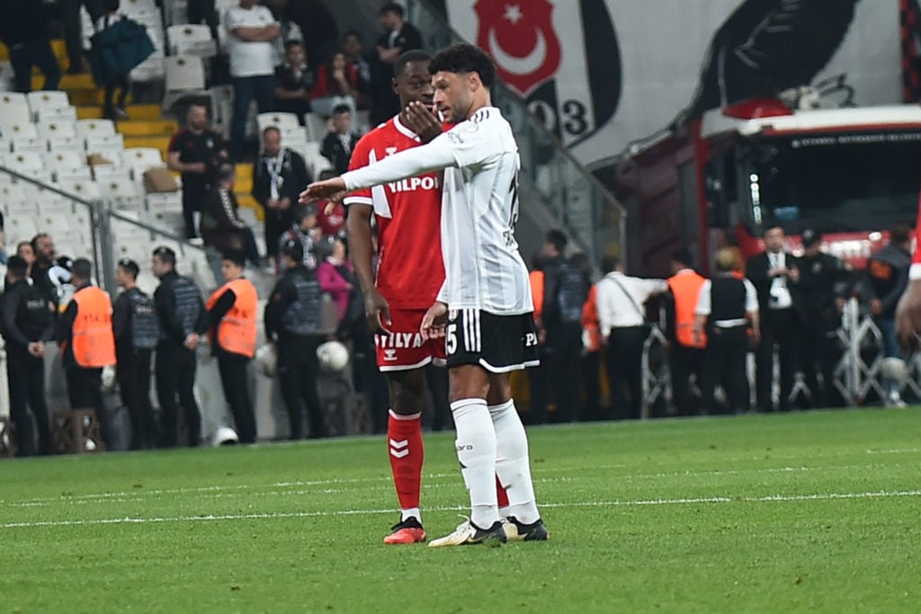 Alex Oxlade-Chamberlain (15) of Besiktas reacts to Kingsley Schindlerof Samsunspor during the Turkish Super League match between Besiktas and Samsu...