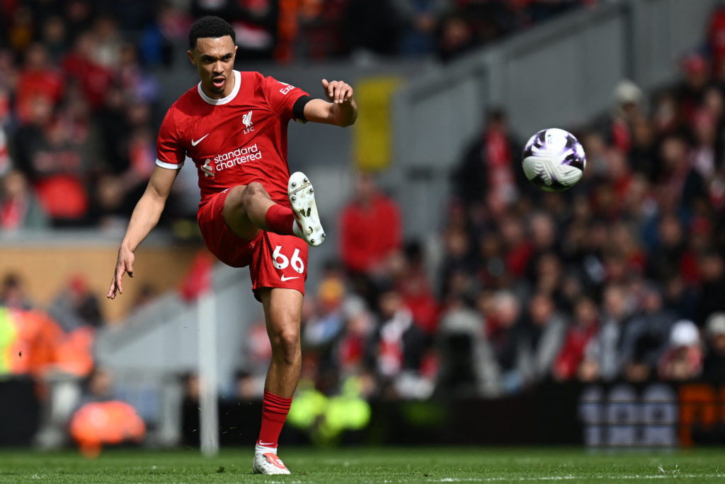Liverpool's English defender #66 Trent Alexander-Arnold crosses the ball during the English Premier League football match between Liverpool and Cry...