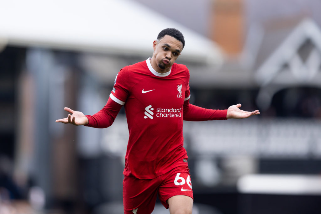 Trent Alexander-Arnold of Liverpool celebrates after scoring his side's first goal during the Premier League match between Fulham FC and Liverpool ...