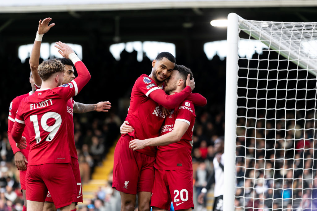 Diogo Jota of Liverpool celebrates with Cody Gakpo of Liverpool after scoring his side's third goal during the Premier League match between Fulham ...