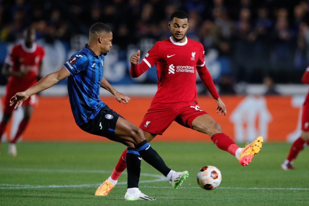 Cody Gakpo of Liverpool tries to intercept a pass by Isak Hien of Atalanta during the UEFA Europa League 2023/24 Quarter-Final second leg match bet...