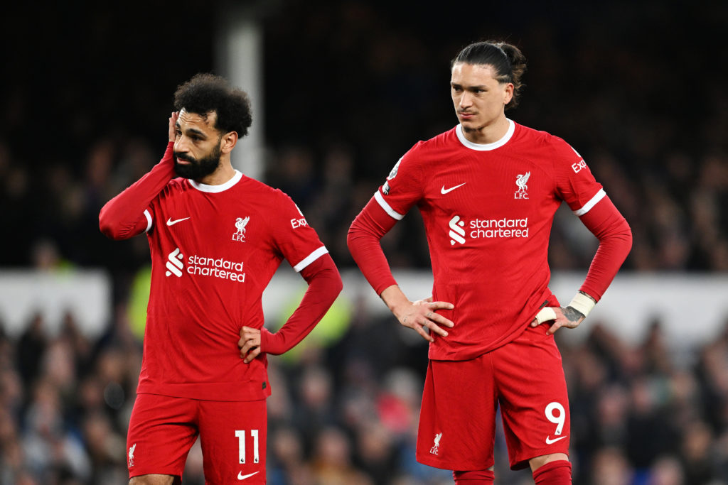 Mohamed Salah and Darwin Nunez of Liverpool react as they look on during the Premier League match between Everton FC and Liverpool FC at Goodison P...
