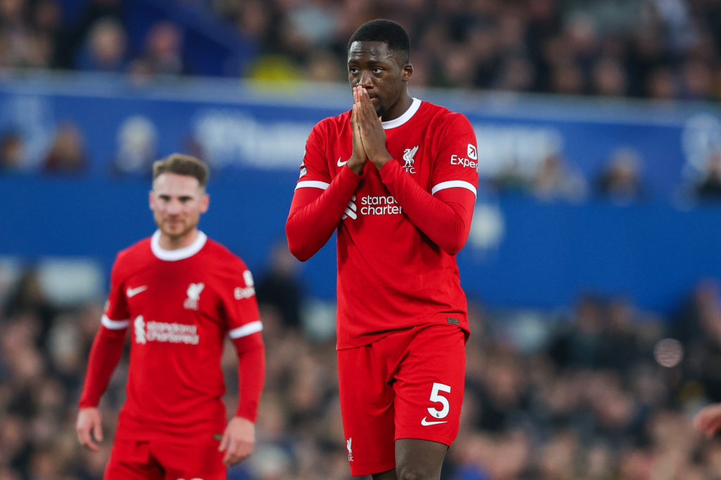 Ibrahima Konate of Liverpool looks dejected during the Premier League match between Everton FC and Liverpool FC at Goodison Park on April 24, 2024 ...