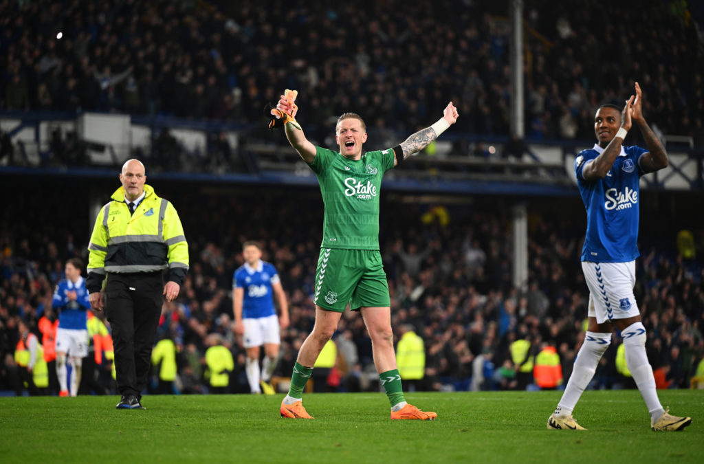 Jordan Pickford of Everton celebrates after the team's victory in the Premier League match between Everton FC and Liverpool FC at Goodison Park on April 24, 2024