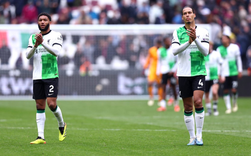 Joe Gomez and Virgil Van Dijk of Liverpool applaud the fans after the Premier League match between West Ham United and Liverpool FC at London Stadi...