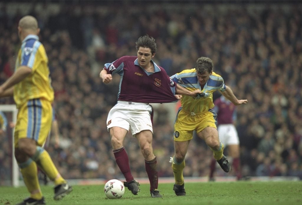 Frank Lompard of West Ham United and Mark Hughes of Chelsea