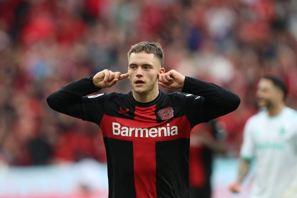 Florian Wirtz of Bayer 04 Leverkusen celebrates after scoring his team's third goal during the Bundesliga match between Bayer 04 Leverkusen and SV ...