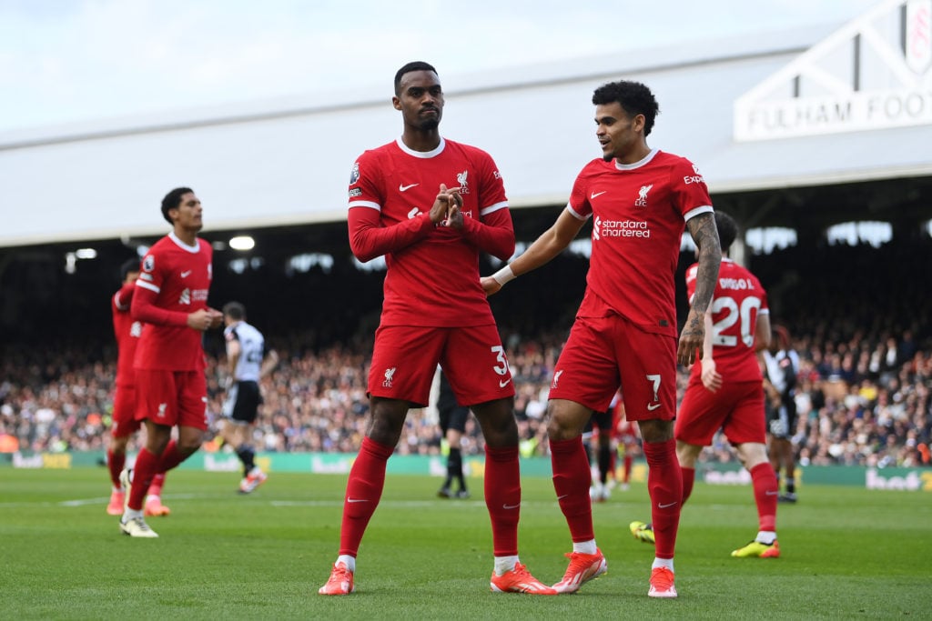 Ryan Gravenberch of Liverpool celebrates scoring his team's second goal with teammate Luis Diaz during the Premier League match between Fulham FC a...