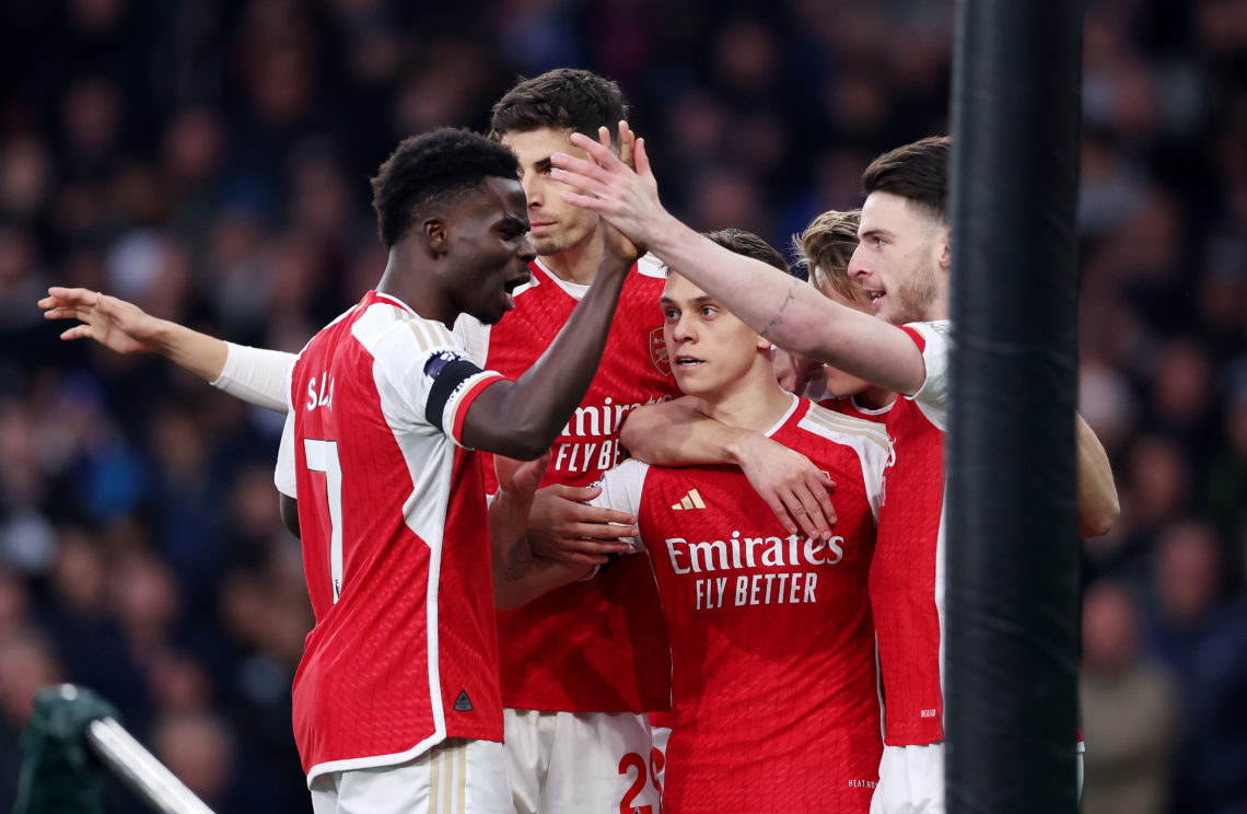 Leandro Trossard celebrates scoring his team's first goal with Declan Rice and Bukayo Saka (obscured) during the Premier League match between Arsen...