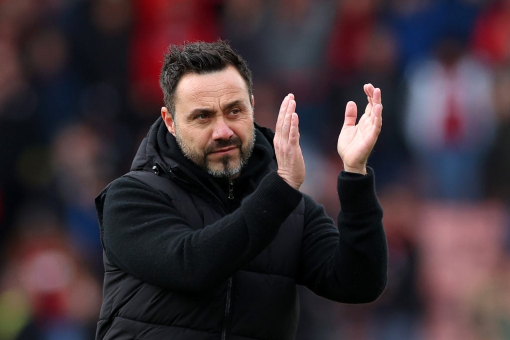 Roberto De Zerbi applauding the fans after a Brighton game