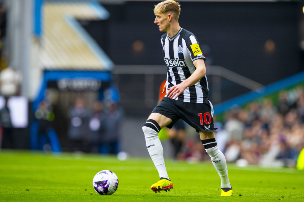 Anthony Gordon #10 of Newcastle United is playing during the Premier League match between Burnley and Newcastle United at Turf Moor in Burnley, on ...