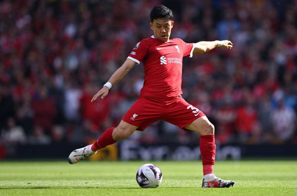 Wataru Endo of Liverpool in action during the Premier League match between Liverpool FC and Tottenham Hotspur at Anfield on May 05, 2024 in Liverpo...