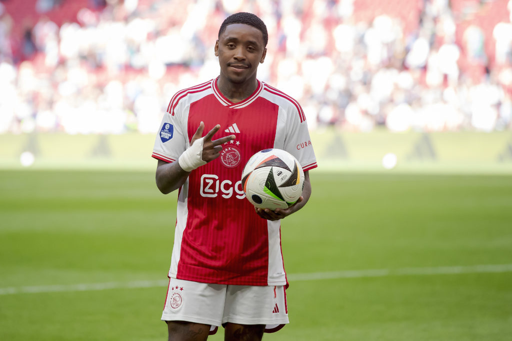 Steven Bergwijn of Ajax with the matchball after scoring three goals during the Dutch Eredivisie  match between Ajax v Almere City at the Johan Cru...