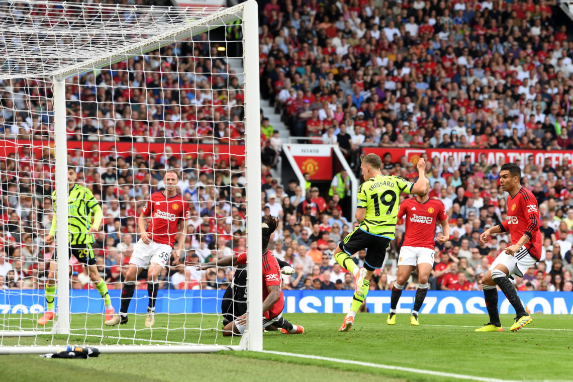 Leandro Trossard of Arsenal scores his team's first goal during the Premier League match between Manchester United and Arsenal FC at Old Trafford o...