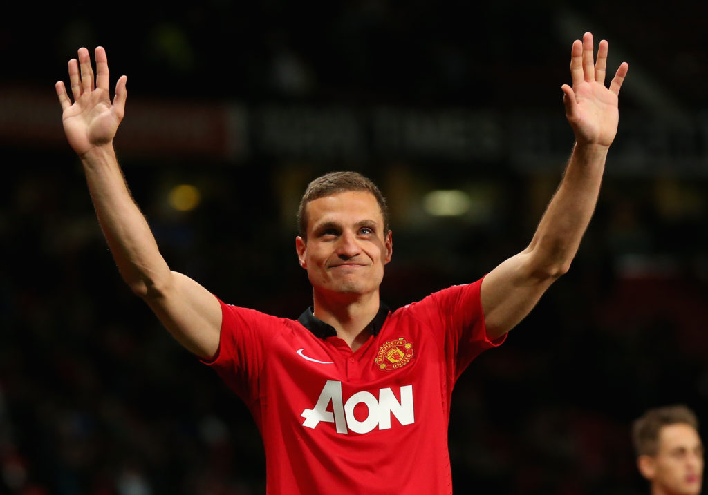 Nemanja Vidic waves to Manchester United fans
