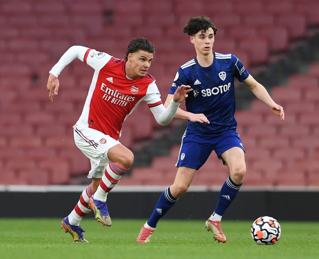 Omar Rekik of Arsenal takes on Archie Gray of Leeds during the PL2 match between Arsenal U23 and Leeds United U23 at Emirates Stadium on April 29, ...