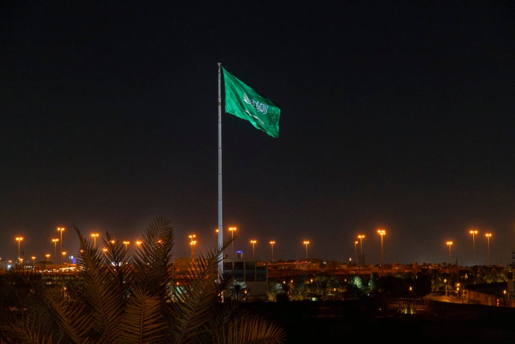 A large flag of the Kingdom of Saudi Arabia is seen flying near Riyadh, Saudi Arabia on 14 December, 2023.