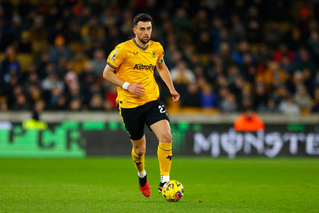 Max Kilman of Wolverhampton Wanderers runs with the ball during the Premier League match between Wolverhampton Wanderers and Manchester United at M...
