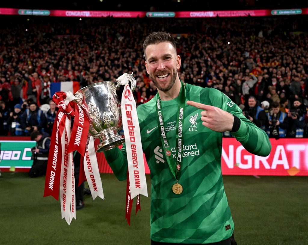 (THE SUN OUT, THE SUN ON SUNDAY OUT) Adrian of Liverpool with the Carabao Cup trophy at the end of the Carabao Cup Final between Chelsea and Liverp...