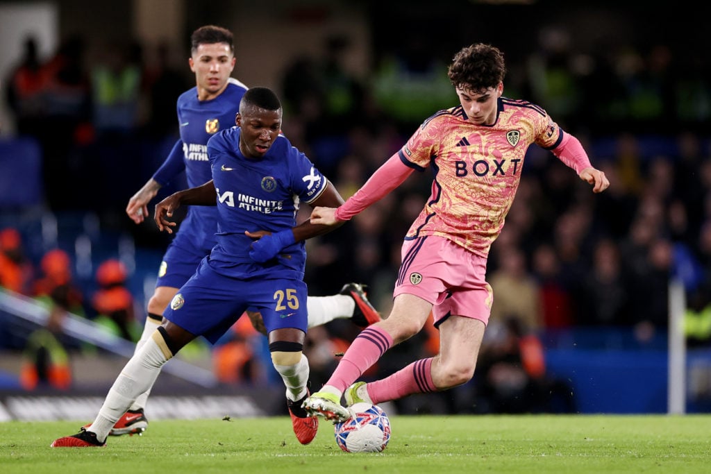 Archie Gray of Leeds United runs with the ball whilst under pressure from Moises Caicedo of Chelsea during the Emirates FA Cup Fifth Round match be...