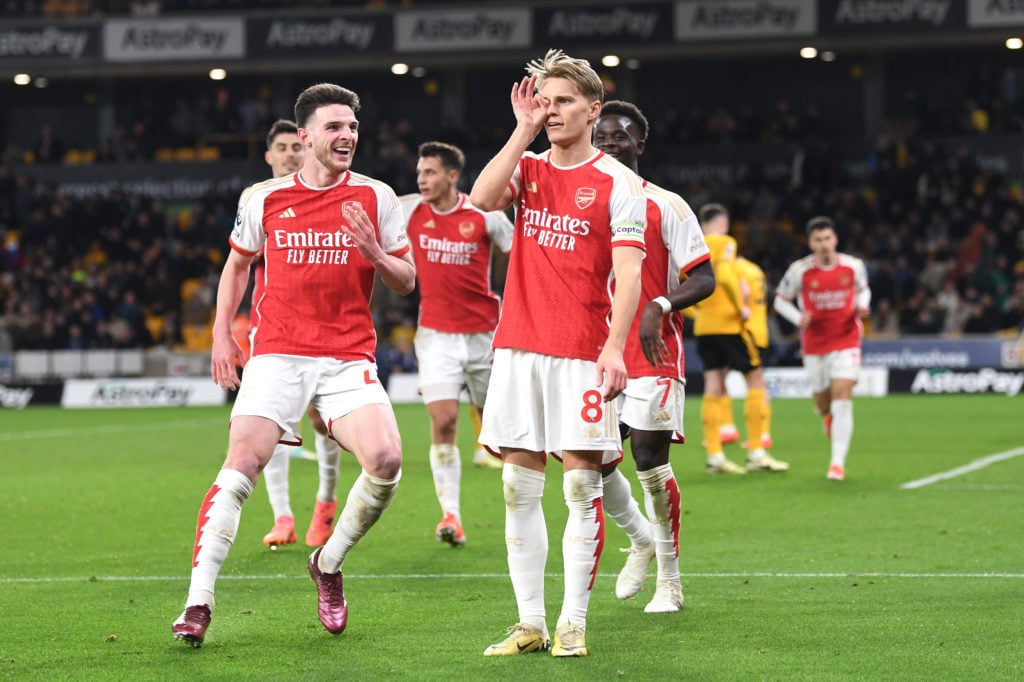 Martin Odegaard of Arsenal celebrates scoring his team's second goal during the Premier League match between Wolverhampton Wanderers and Arsenal FC...