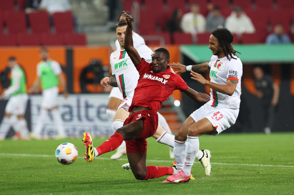 Sehrou Guirassy of VfB Stuttgart scores his team's first goal during the Bundesliga match between FC Augsburg and VfB Stuttgart at WWK-Arena on May...