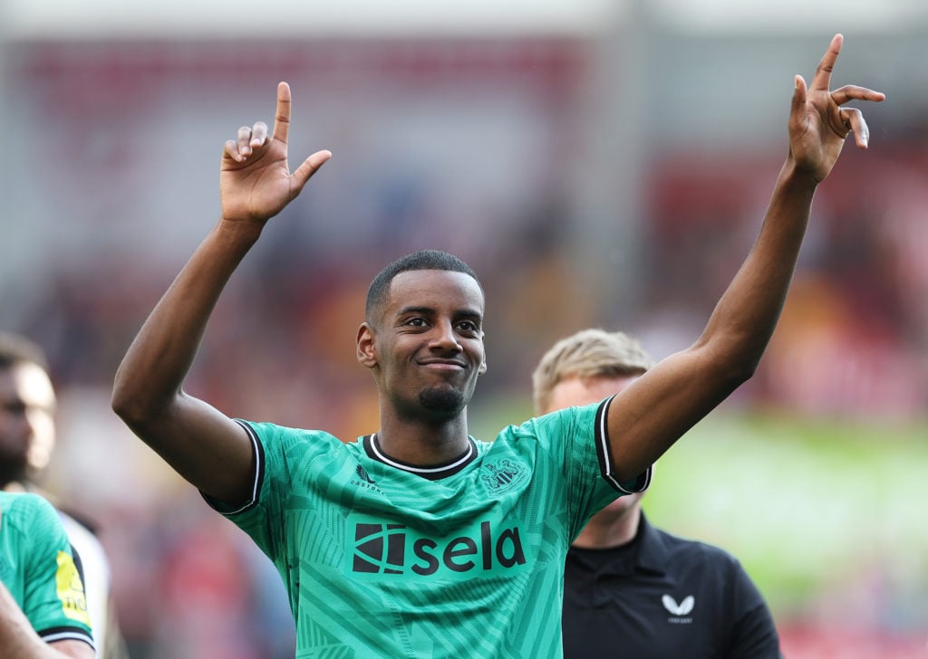 Alexander Isak of Newcastle United celebrates following the team's victory in the Premier League match between Brentford FC and Newcastle United at...