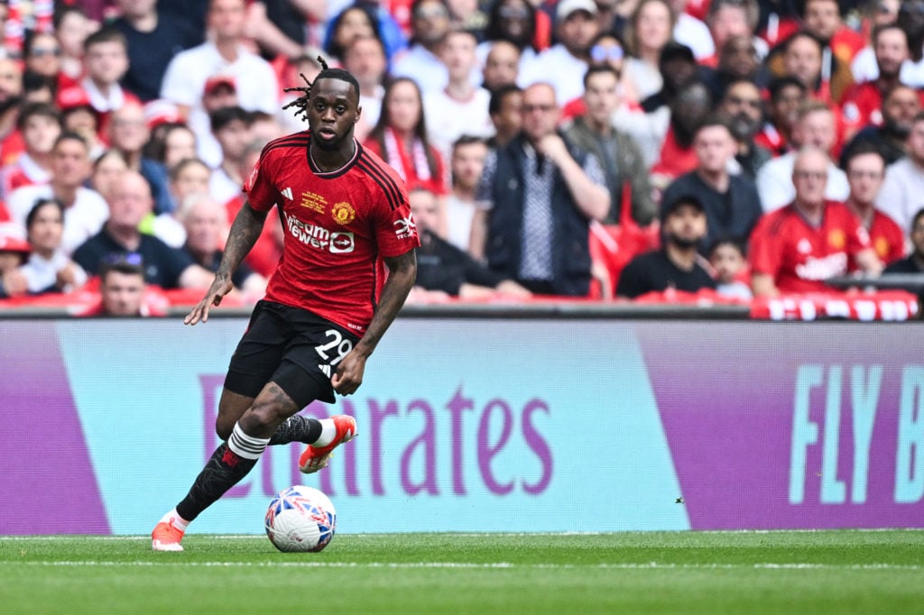 Manchester United's English defender #29 Aaron Wan-Bissaka controls the ball during the English FA Cup final football match between Manchester City...