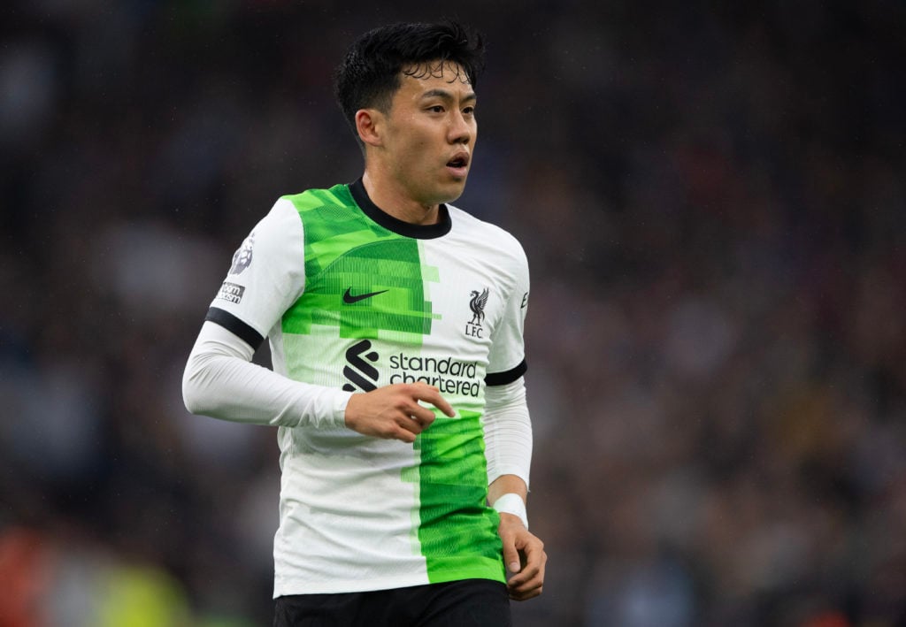 Wataru Endo of Liverpool during the Premier League match between Aston Villa and Liverpool FC at Villa Park on May 13, 2024 in Birmingham, England.