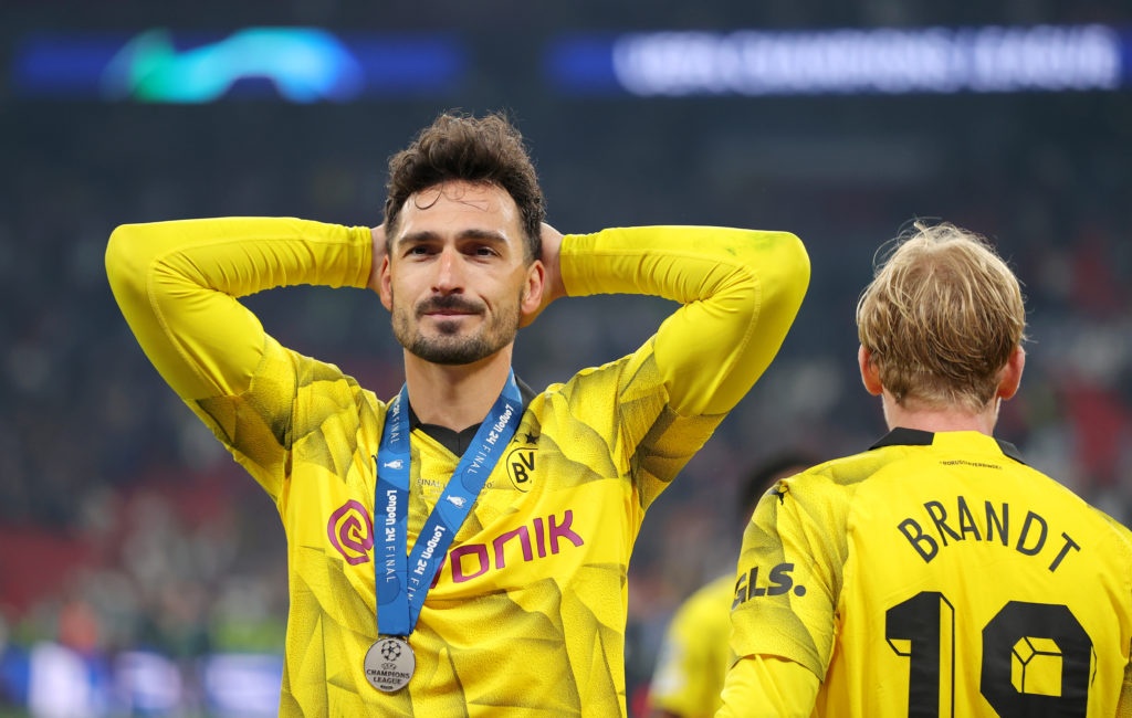 Mats Hummels of Borussia Dortmund looks dejected, whilst wearing his runners up medal, after Real Madrid defeat Borussia Dortmund during the UEFA C...
