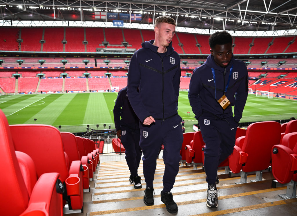 Cole Palmer and Bukayo Saka of England arrive at the stadium prior to the international friendly match between England and Iceland at Wembley Stadi...