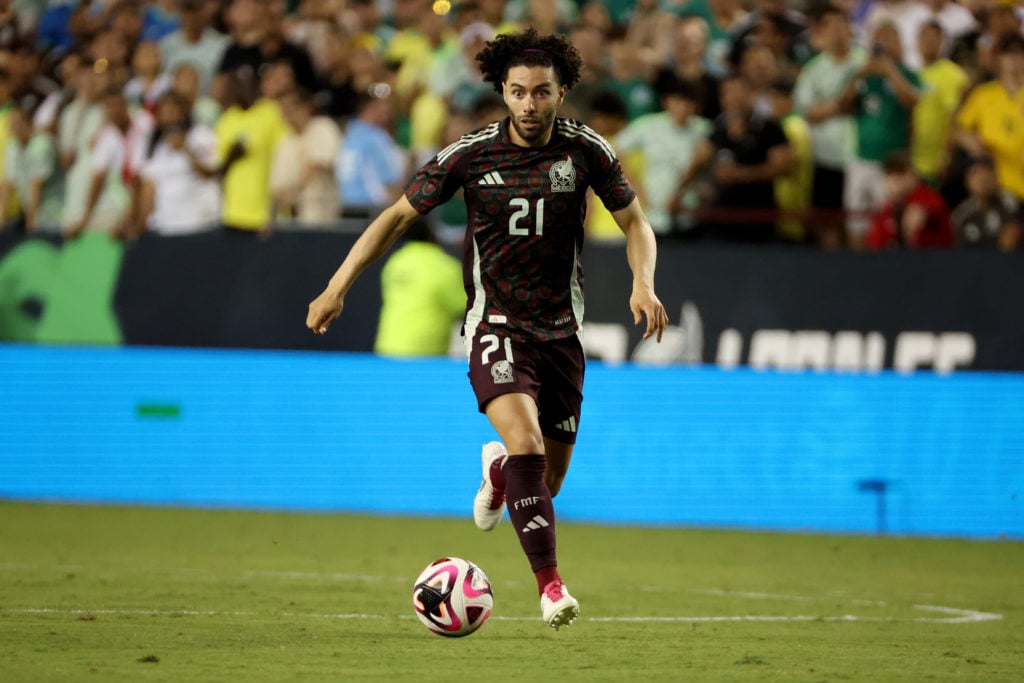 Cesar Huerta #21 of Mexico dribbles the ball in the second half against Brazil during the International Friendly at Kyle Field on June 08, 2024 in ...