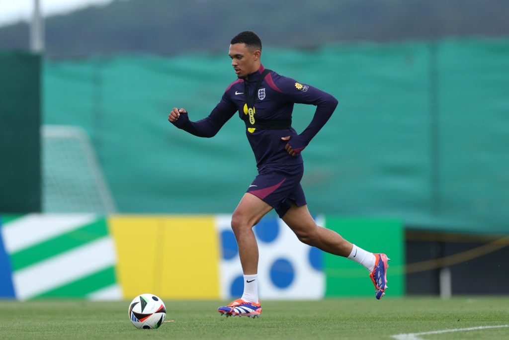 Trent Alexander-Arnold of England runs with the ball during a training session at Spa & Golf Resort Weimarer Land on June 12, 2024 in Blankenha...