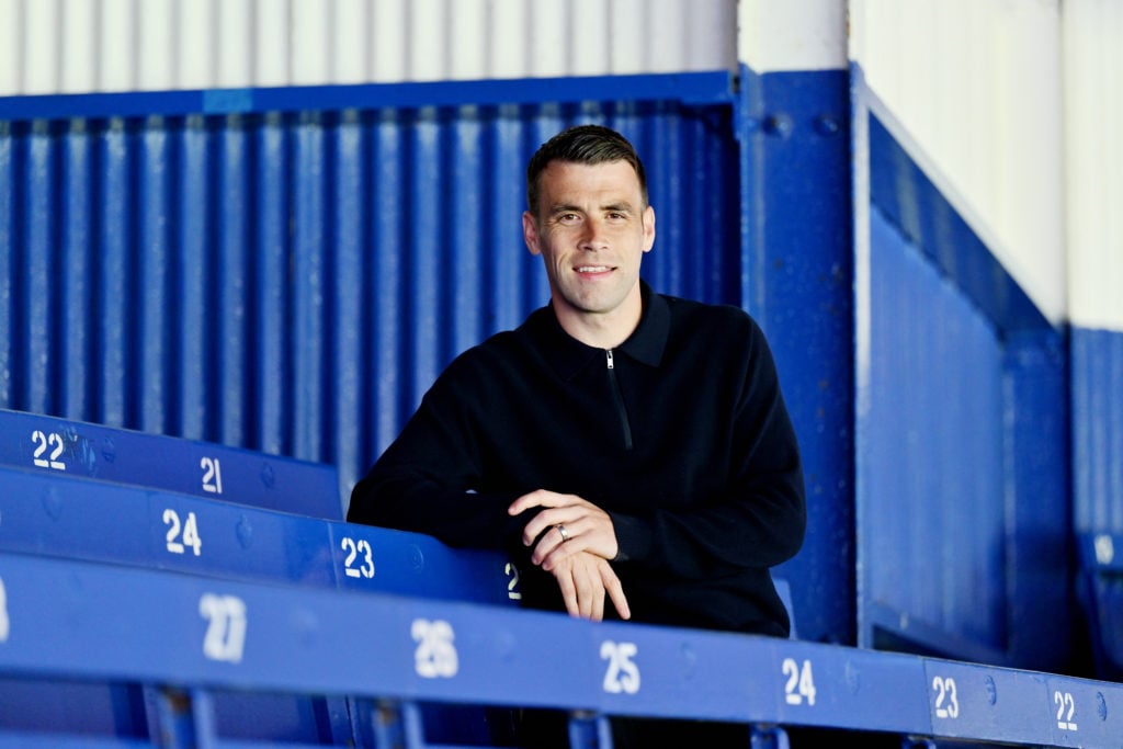 Seamus Coleman poses for a photo after signing a new contract with Everton at Goodison Park on June 12, 2024 in Liverpool, England.