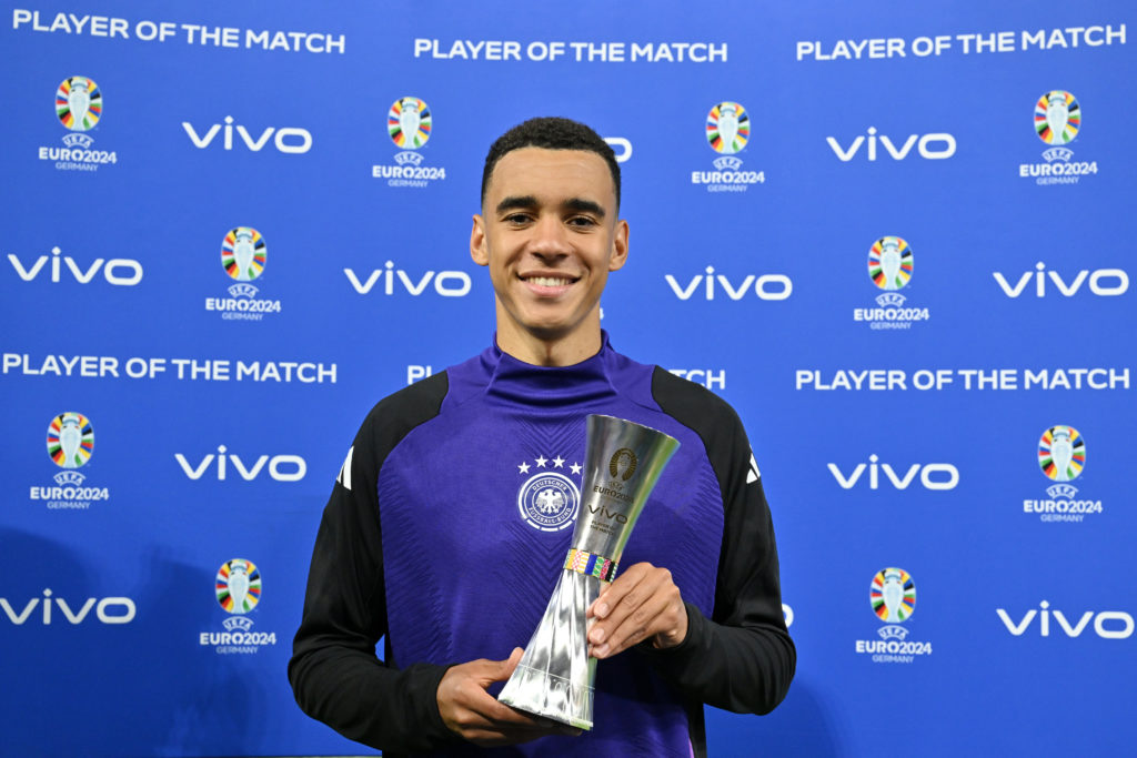 Jamal Musiala of Germany poses for a photograph with the Vivo Player of the Match Award after Germany defeat Scotland during the UEFA EURO 2024 gro...
