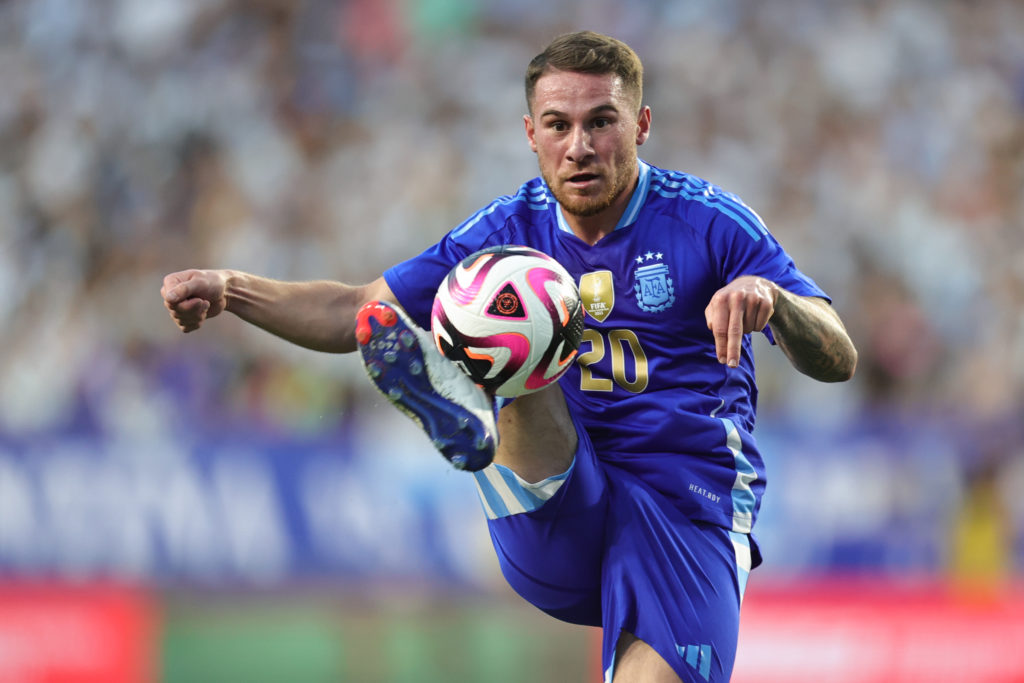 Alexis Mac Allister #20 of Argentina controls the ball during an international friendly match against Guatemala at Commanders Field on June 14, 202...