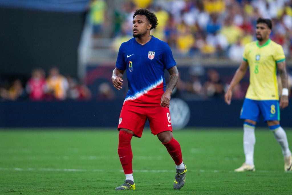 Weston McKennie #8 of the United States waits for the free kickan international friendly game at Camping World Stadium on June 12, 2024 in Orlando,...