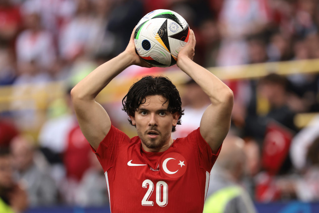 Ferdi Kadioglu of Turkey prepares to take a throw in during the UEFA EURO 2024 group stage match between Turkiye and Georgia at Football Stadium Do...