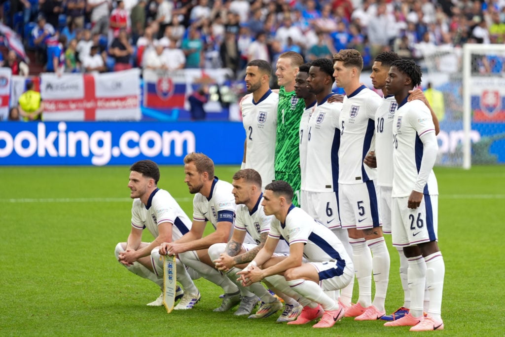 Players of England pose for a team photo ahead of the EURO 2024 round of 16 football match between England and Slovakia at Veltins-Arena in Gelsenk...