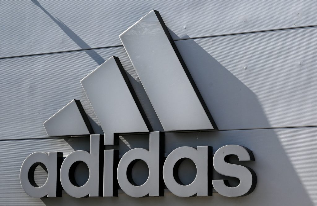 The company logo of Germany's sports equipment maker Adidas is seen on a building in Herzogenaurach, southern Germany, on July 3, 2023. (Photo by C...