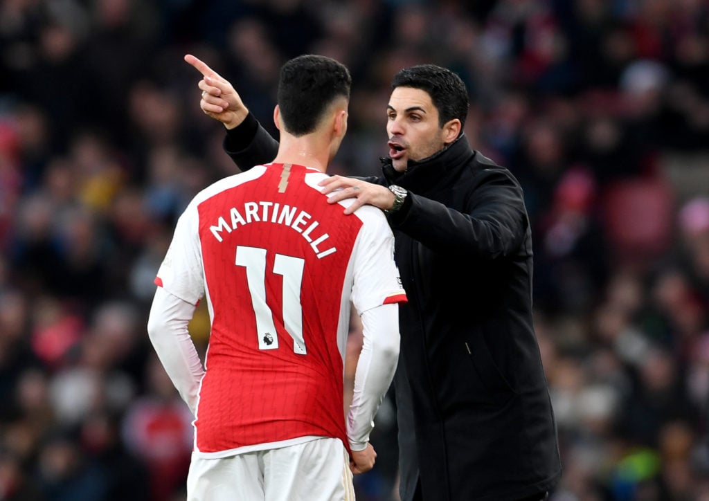 Mikel Arteta speaks to Gabriel Martinelli of Arsenal during the Premier League match between Arsenal FC and Brighton & Hove Albion at Emirates ...