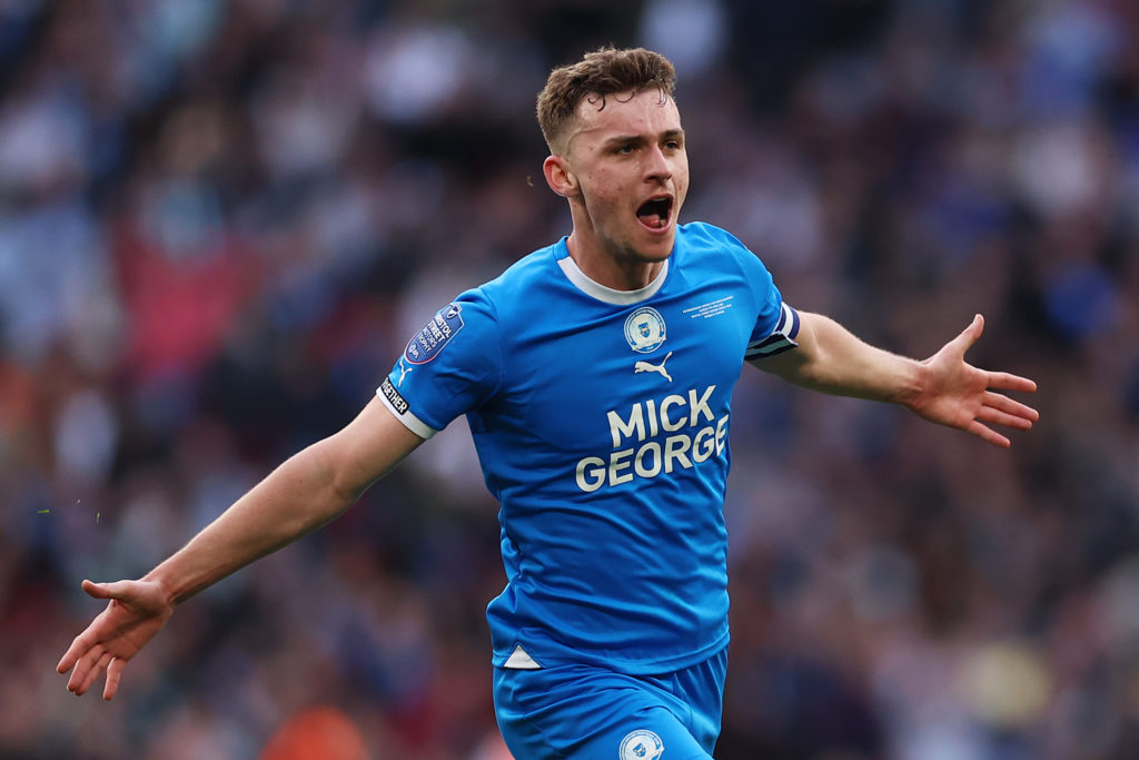 Harrison Burrows of Peterborough United celebrates scoring his team's second goal during the Bristol Street Motors Trophy Final between Peterboroug...